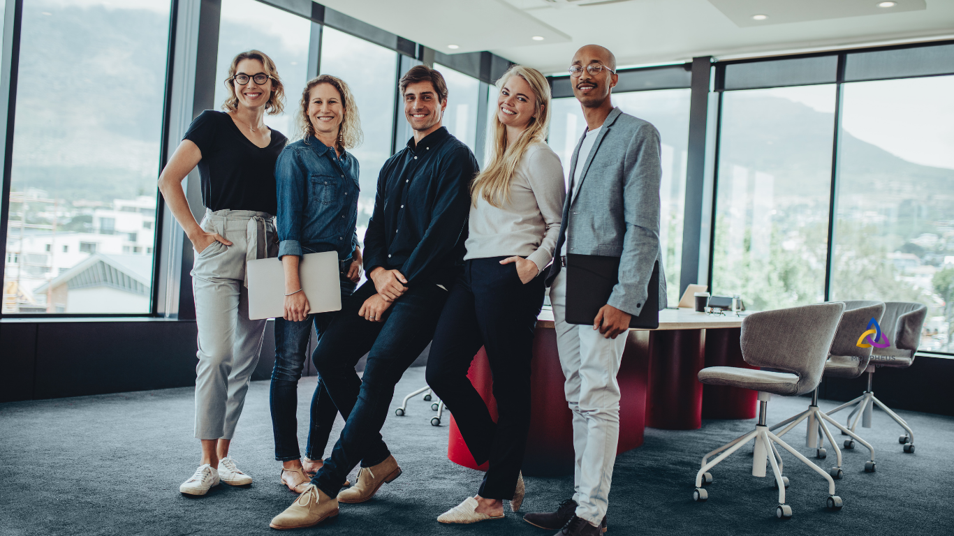 Morpheus Group | Remote Support That Feels In-House 6 Group of diverse professionals smiling together in a modern office